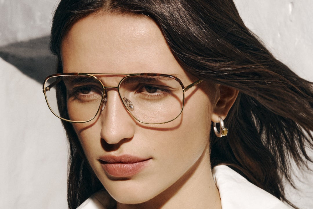 Prada PR 65ZS ZVN70L 55 Zonnebrillen | Bassol Optic Translation Prada PR 65ZS ZVN70L 55 Zonnebrillen | Bassol Optic Translation